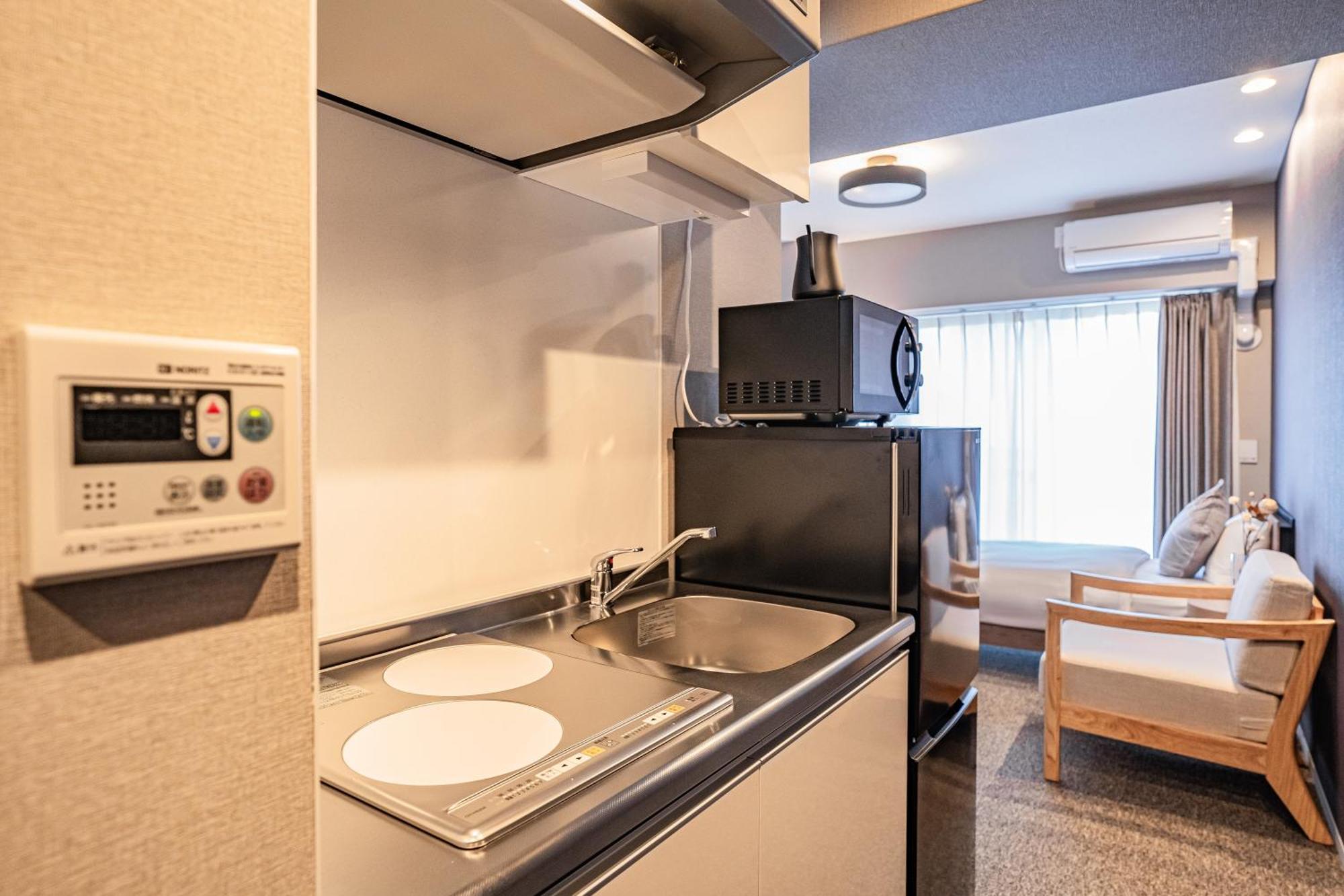 Apartment Hotel 11 Umeda Kamiyama Osaka Zewnętrze zdjęcie
